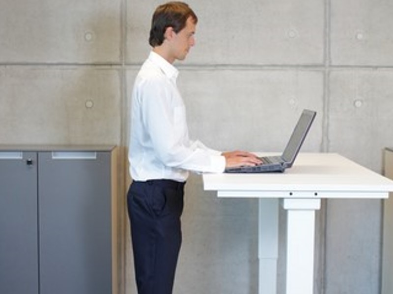 stand at height-adjustable desk